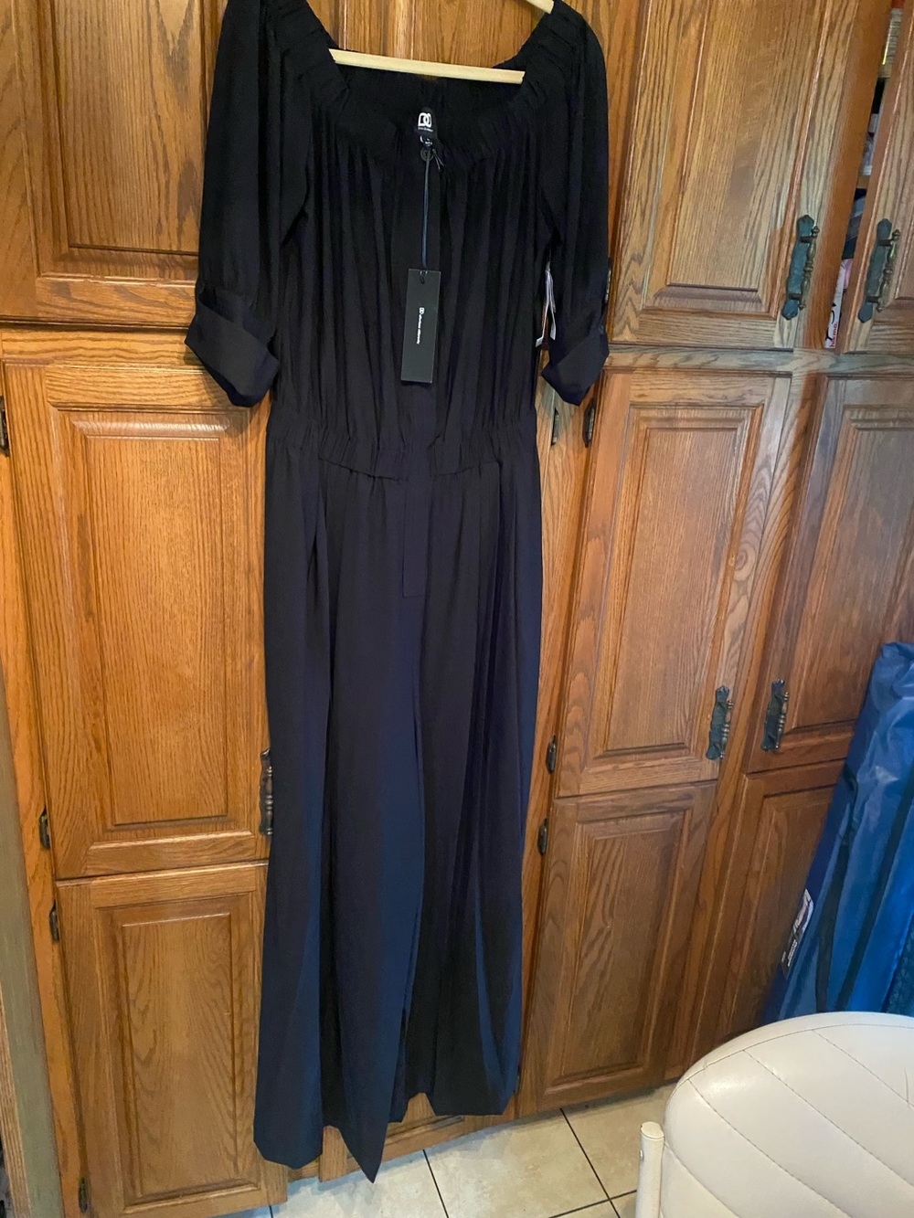 Black Long-Sleeve Women's Jumpsuit with Gathered Neckline